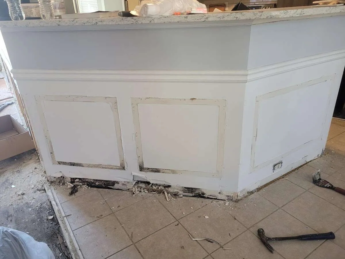 Water damage and mold on kitchen during Storm Damage Restoration in Ayer